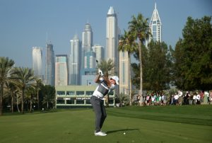 DUBAI, UNITED ARAB EMIRATES - FEBRUARY 04:  Rory McIlroy of Northern Ireland plays his second shot on the 16th hole during the first round of the Omega Dubai Desert Classic at The Emirates Golf Club on February 4, 2016 in Dubai, United Arab Emirates.  (Photo by Warren Little/Getty Images)