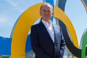 RIO DE JANEIRO, BRAZIL - 16/08/2016: Peter Dawson, President of the IGF poses for a photograph in front of the Olympic Rings during the Monday Practice round at the Rio 2016 Olympic Games, Reserva de Marapendi Golf Course, Barra Da Tijuca, Rio De Janeiro, Brazil. (Photo by Tristan Jones/IGF)